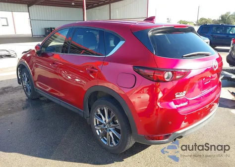 2021 Mazda Cx-5 Signature z USA, uszkodzony, nr VIN JM3KFBEY4M0400545